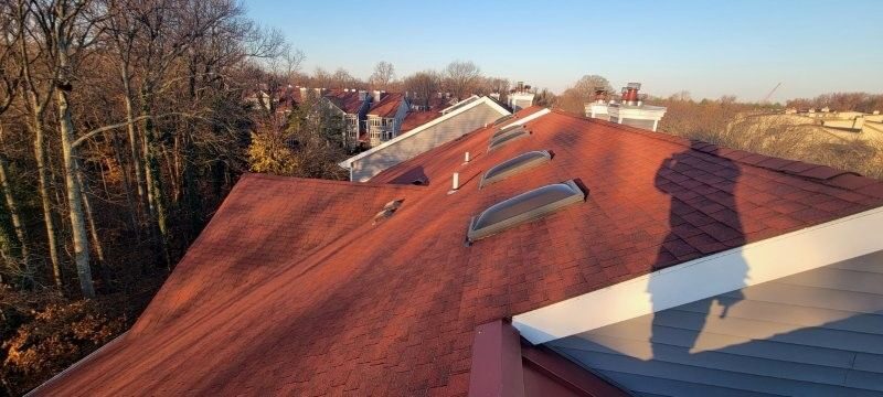 Protective roof coating applied over an existing roof